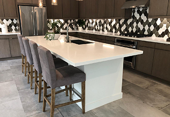 Modern kitchen renovation in Rosemead featuring custom island and hexagonal tile backsplash